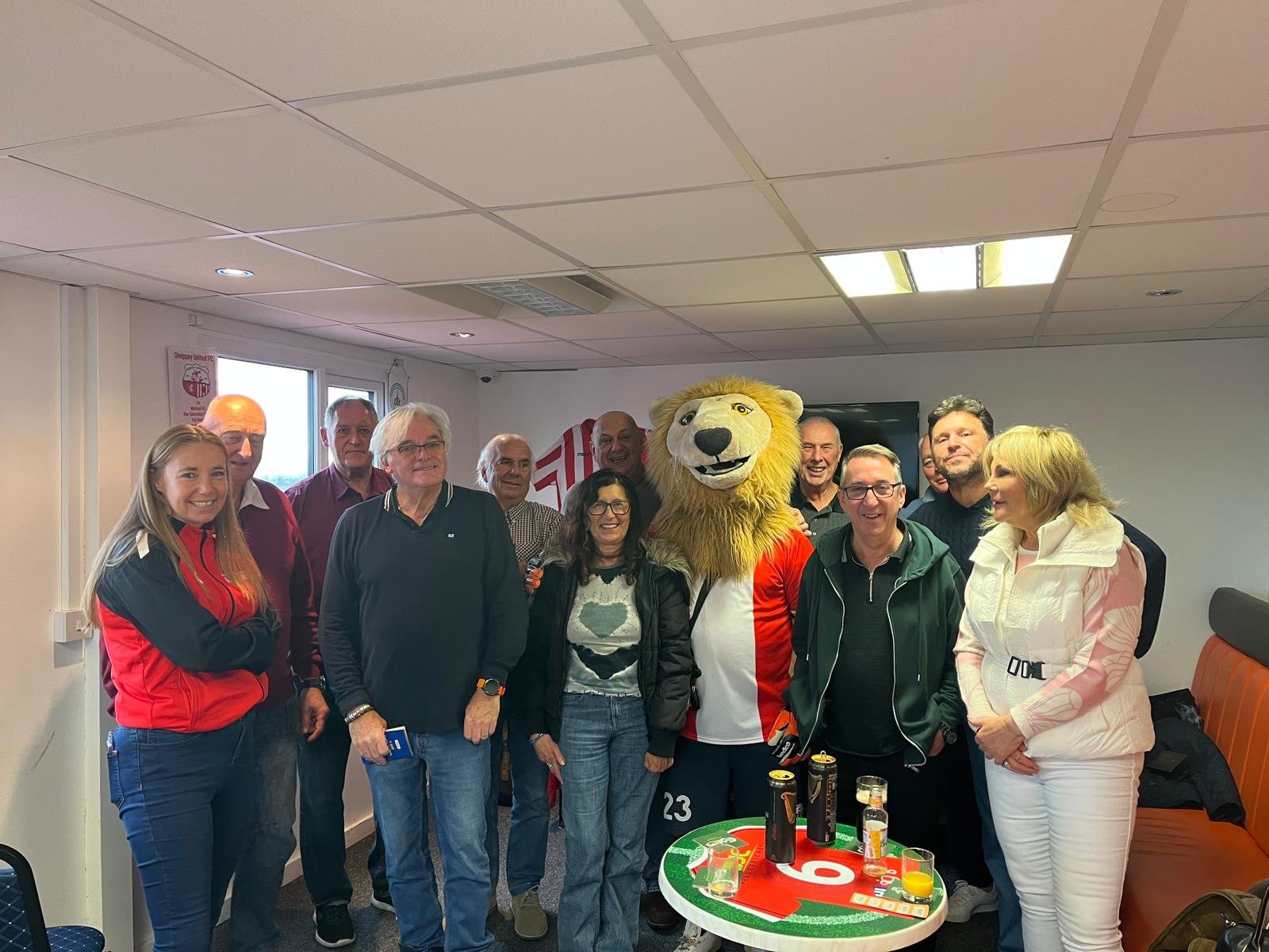 Club social with the lion mascot